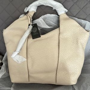 Vince Camuto Leather bag.  Has shoulder strap still wrapped.  Brand new.